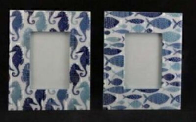 Fish or Seahorse photo frame by Gisela Graham. Blue and white in colour and made with high Gloss Wooden Rectangle Picture Frame. If preference please specify Fish or seahorse when ordering. For photo size 5